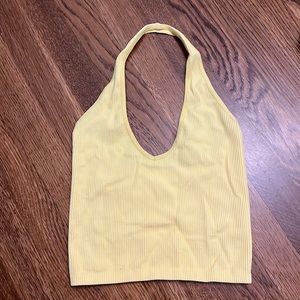 Out from under yellow halter